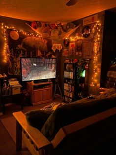 a living room filled with furniture and a flat screen tv mounted to the side of a wall