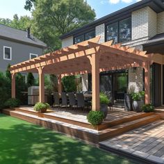 an outdoor patio with wooden decking and pergolated area next to the house