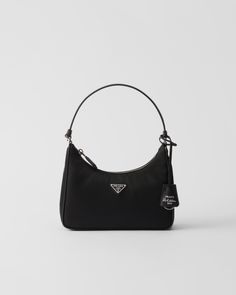 Zipper closure Enameled metal triangle logo Leather handle Re-Nylon logo lining Prada Mini Bag Outfit, Bags Shoulder, Purses Black Women, Handbags Luxury, Mini Shoulder Bags, Bags Mini, Luxury Mini Bag, Prada Handbag, Purses And Bags Designer