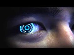 a person's eye with glowing blue circles in the center and on top of it