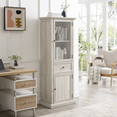 a white bookcase sitting next to a wooden desk