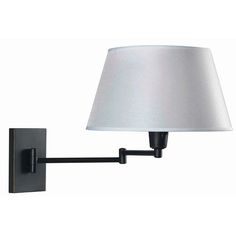 a wall light with a white shade on the lamp and black metal arm, against a white background