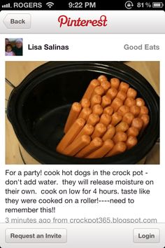 carrots in a black crock pot on a counter top, with the tops turned upside down