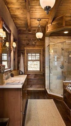 a bathroom with wooden walls and flooring