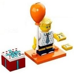 a lego man holding a balloon and gift box