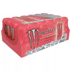 monster energy drinks are in pink boxes with silver foil on the bottom and one is red