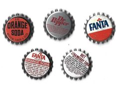 six orange soda bottle caps with the words fanta printed on one side and an orange soda can in the other