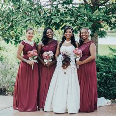 the bride and her four bridesmaids pose for a photo