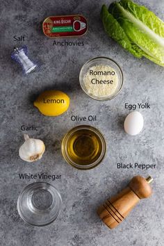 ingredients to make an egg salad laid out on a gray counter top, including lettuce