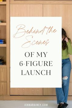 a woman holding up a sign that says behind the scenes of my 6 figure launch