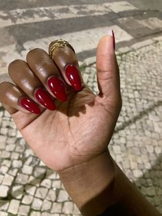 red nails season 💋 Dark Feminine Red Nails, Dark Red Glossy Nails, Burgundy Nails With Gems, Red Nails Dark Skin, Big Apple Red Nails, Cherry Red Nails Short, Short Almond Red Nails, Cranberry Red Nails