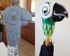 an odd looking bird statue is shown next to another sculpture that looks like it's made out of plastic