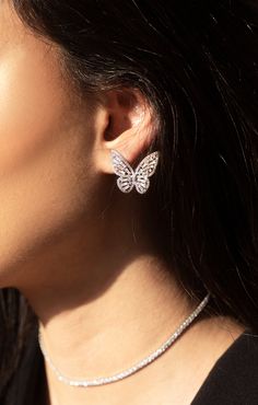 A fashionable change is in the air with our beautiful Alara butterfly studs! Butterflies represent change and possibilities, allowing limitless abundance into our life. Wear these nature-inspired filigree butterfly earrings for a dose of luck and style. Metal Type: Platinum PlatingStone: Cubic Zirconia Color: SilverSize: 0.7" Butterfly Earrings Stud, Butterfly Earrings, Colorful Butterflies, Dream Jewelry, Earring Gifts, Gemstone Earrings, Earrings Handmade, Nature Inspired, Our Life