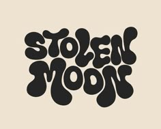 the word stolen moon written in black on a beige background