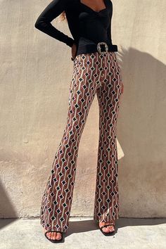 These High Waist Bell Bottoms Printed Pants are the perfect way to add a stylish statement to any outfit. They feature a sleek high waist fit and a unique print for a modern, fashion-forward look. Feel comfortable and stylish all in one.Material:Cotton+PolyesterSIZEUS/CANBUSTWAISTHIPSS2-433"-34"26"-27"36"-37"M6-835"-36"28"-29"38"-39"L10-1237"-39"30"-32"40"-42"XL12-1440"-42"33"-35"43"-45" Chic Abstract Print Pants For Spring, Casual Wide Leg Pants With Abstract Print, Casual Fitted Bottoms With Abstract Print, Casual Wide Leg Pants With Bold Print, Chic Graphic Print Bottoms For Spring, Chic Printed Ankle-length Wide Leg Pants, Chic Ankle-length Printed Wide Leg Pants, Chic Printed Patterned Pants, Chic Patterned Printed Pants