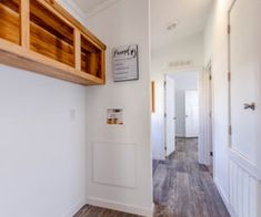 the hallway is clean and ready for us to use as a storage area in this home