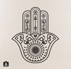 the hamsa wall decal is shown in black and white