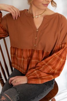 A waffle knit top with the following features: Henley neckline. Buttoned closure. Long bubble sleeves in contrasting plaid. Dropped shoulder. Ruffled plaid hem. Babydoll silhouette. Loose fit. Model Info: Height: 5 ft 10 in | Bust: 34 in | Waist: 24 in | Hips: 34 in | Wearing Size S. Material: 65% Polyester 35% Cotton Waffle Clothing, Knitted Top Outfit, Contrast Top, Waffle Knit Top, Autumn Outfits, Fall Clothes, Fall Fits, Clothing Inspiration, Tops Fall