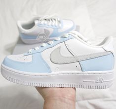 Custom Air Force 1 Blue Sneakers. Gray Swoosh. Low Tops. 🎨Artwork: -Exactly as shown in the picture. -Fully hand painted. -Applied Special Acrylic Paint for Shoes and Finisher for more Durability.  -Waterproof and flexible. -We strongly recommend the use of the Anti Crease Protectors included to prolong the durability of the paint in certain areas when feet bend. 👟Sneakers: -100 % Authentic Air Force 1 Sneakers, purchased at official stores in the US, then customized by hand.  📐Size: -C (Chil Luxury Blue Nike Air Force 1 With Round Toe, Luxury Blue Casual Custom Sneakers, Luxury Light Blue Custom Sneakers For Sports, Luxury Custom Sneakers For Sports In Light Blue, Fun Blue Affordable Sneakers, Cheap Fade-resistant Blue Sneakers, Cheap Blue Fade-resistant Sneakers, Cheap Light Blue Sneakers For Sports, Nike Air Force One Blue