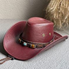 Show off your cowboy style with our Cowgirl Adjustable Faux Leather Western Hat. Made from high-quality faux leather, it features a curved wide brim that protects you from the sun in style. The adjustable drawstring ensures a snug fit. Pair it with a denim jacket and boots for an ultimate western look. Disco cowgirl western hat Faux leather Internal adjustable drawstring Curved wide brim Height: 56cm / 22in Trendy Adjustable Leather Hat, Retro Adjustable Hat For Rodeo, Adjustable Leather Hat For Fall, Adjustable Leather Fall Hats, Retro Adjustable Hat Band For Rodeo, Casual Leather Hat Bands For Rodeo, Casual Leather Hat For Rodeo, Leather Hats For Fall Festival, Adjustable Leather Hats For Festivals