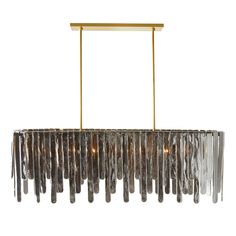 a modern chandelier with glass tubes hanging from it's brass finish frame