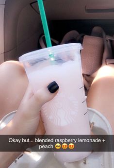 a woman is holding a starbucks drink with a straw in her hand and the caption reads okay but blended raspberry lemonade + peach