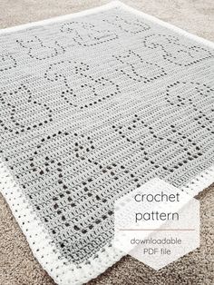 the crochet pattern is shown in grey and white