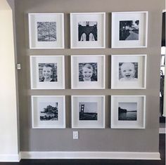 a bunch of pictures are hanging on the wall