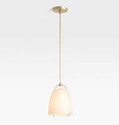 a white and gold colored light hanging from a ceiling fixture with an oval glass shade