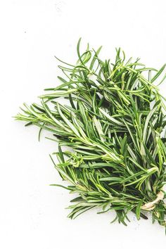 Fresh rosemary bunch and jute rope on white stone table background. Spicy herb for cooking Top view.  stock photos White Stone Table, Cooking Herbs, Table Background, Stone Table, Jute Rope, Fresh Rosemary, White Stone, View Image, Top View