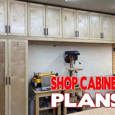 the shop cabinet plans are open and ready to be used for workbench storage