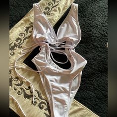 Nwot. Strappy One Piece . Criss Cross Tie . High Cut On Thigh. Will Fit Medium-Large. One Piece Bathing Suit, High Cut, Bathing Suit, Criss Cross, Womens Swim, Bathing Suits, Color White, One Piece, Women Shopping