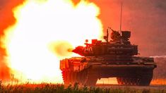 an army tank is shown with fire coming out of it's back end and on its side