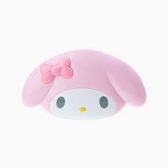 a pink hello kitty alarm clock with a bow on it's head and ears