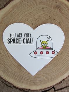 a piece of wood with a heart shaped sticker that says you are very space - gal