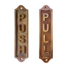 two metal signs that say push and pull