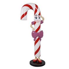 a candy cane with a cartoon character on it's head and arms, standing in front of a white background