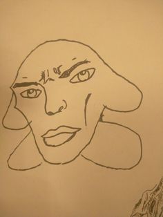 a drawing of a woman's face is shown