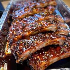 bbq ribs covered in barbecue sauce and seasoning