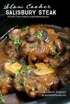 a bowl filled with meat and mushrooms covered in gravy