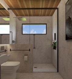 a bathroom with a white toilet sitting next to a walk in shower