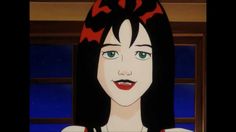 an animated image of a woman with black hair and green eyes wearing a red bow around her head