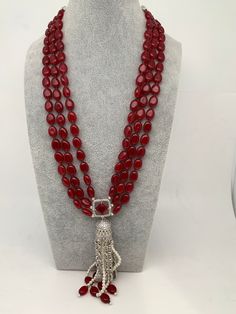 AD Red Stone Pendent Red Monalisa Beads Mala Necklace Length : 24 Inches No Earrings Elegant Long Red Necklace, Red Ruby Bead Necklaces, Elegant Red Long Beaded Necklace, Elegant Long Red Beaded Necklace, Red Beaded Ruby Necklace, Red Ruby Necklace For Celebration, Red Round Beads Jewelry For Festive Occasions, Red Beaded Ruby Jewelry, Red Dangle Necklaces For Party