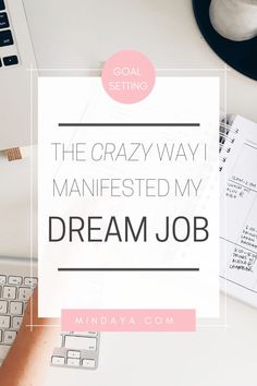 a desk with a laptop, keyboard and mouse on it that says the crazy way i manifested my dream job