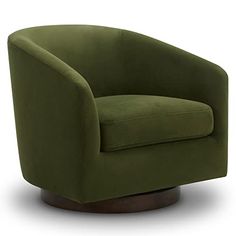 the green chair is sitting in front of a white background