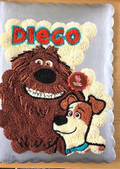 a birthday cake made to look like a dog and a bear with the word diego on it