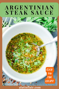 a white bowl filled with green soup and garnished with cilantro