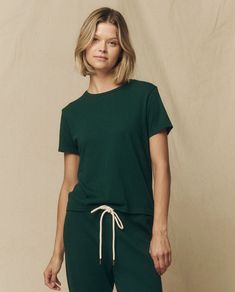 The Little Tee. -- Green Grove – The Great. Wardrobe Inventory, Mens Undershirts, Green T Shirt, Summer Set, Green Tshirt, Lightweight Tops, Layering Pieces