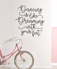 a wall decal that says dancing is like dreaming with your feet