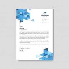 a blue and white letterhead with geometric shapes on the front, side and back